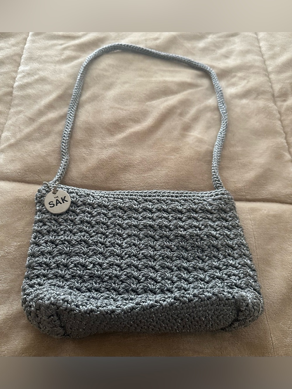 Super versatile- The Sak Silver Crochet Crossbody Shoulder Bag